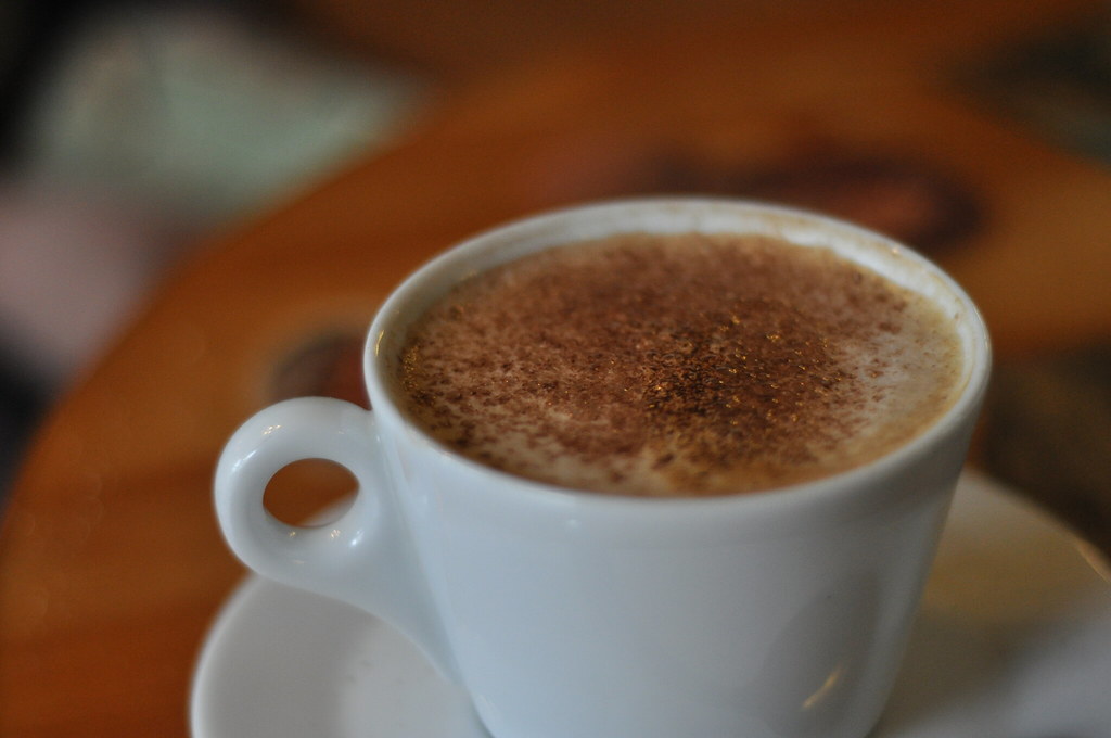A caramel-toned latte dusted with spice