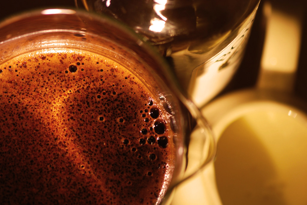 Coffee and liqueur in warm amber light