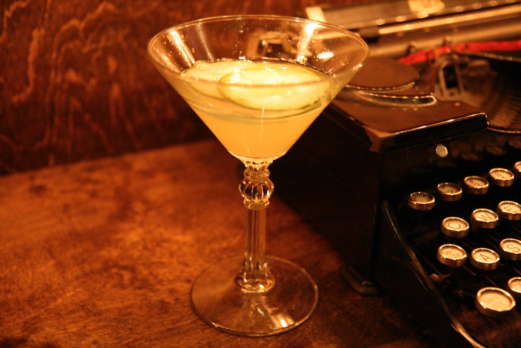 A citrus drink in a vintage cocktail glass