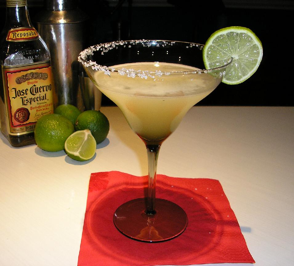 A salt-rimmed margarita with lime